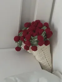 The Bouquet clutch, detail of the rose pom-poms