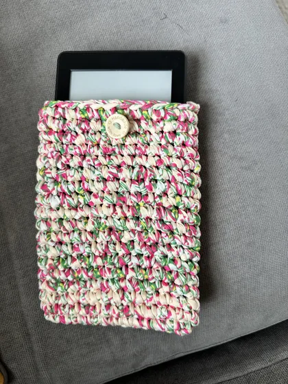 The Confetti pouch, holding a tablet