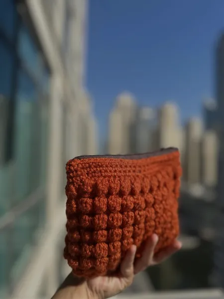 Handmade crochet pouch in rust, bobble stitch