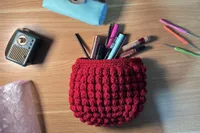 The Ruby pouch, holding makeup essentials