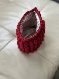 The Ruby pouch, open showing the floral lining